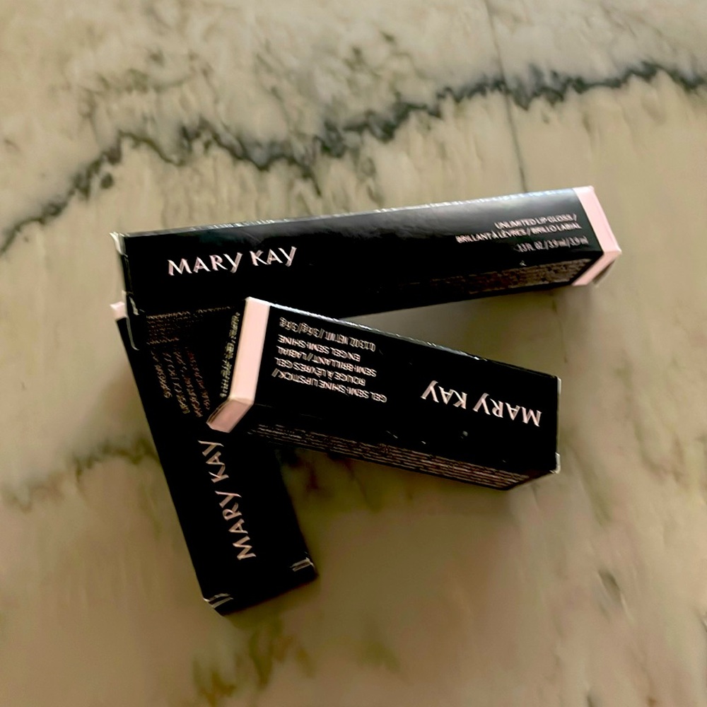 Mary Kay bundle. NEW NEVER USED.           1 lip gloss and 2 lip sticks.